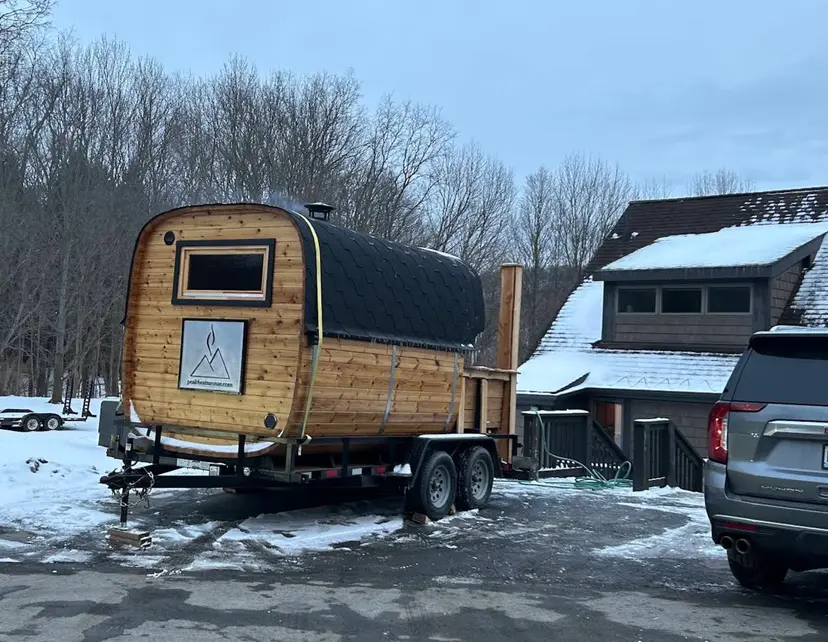 Peak Heat mobile sauna delivered to a snowy home in Ellicottville